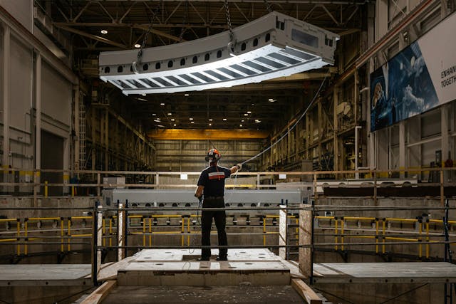 Ingersoll Machine Tools employee guiding movement of an azimuth track